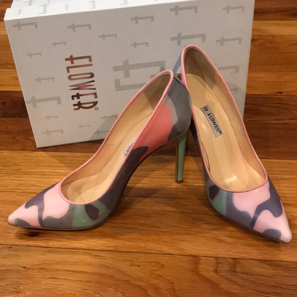 Flower camo pumps with stud on heel. Never worn.